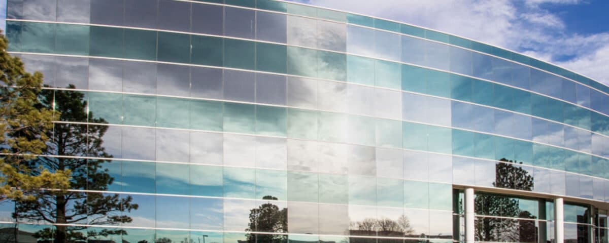 The Presidio is a four-story glass office building at 1155 Kelly Johnson Boulevard in Colorado Springs, Colorado