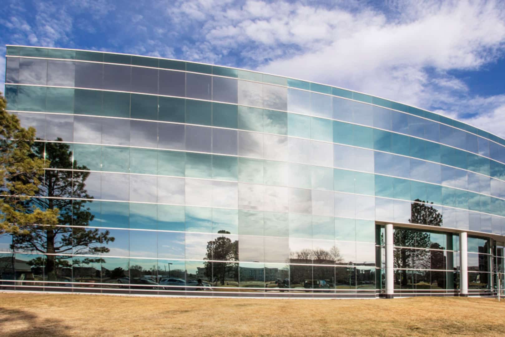 The Presidio is a four-story glass office building at 1155 Kelly Johnson Boulevard in Colorado Springs, Colorado